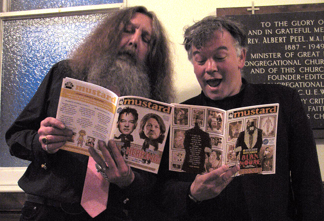 Alan Moore and Stewart Lee reading each other's Mustard mag